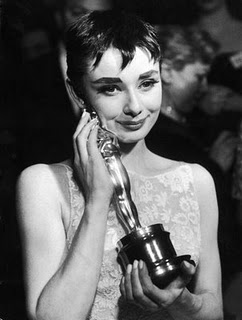 Audrey Hepburn and her Oscar (http://www.papermag.com/2010/03/)